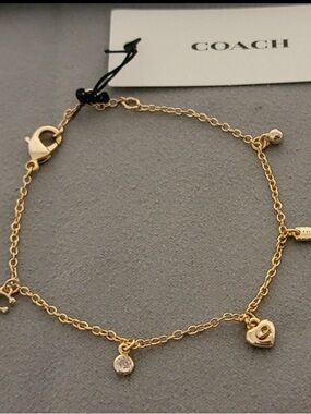 COACH Gold-Tone Heart & Crystal Charm Bracelet
